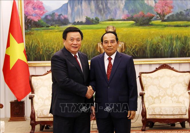 Politburo member, President of Ho Chi Minh National Academy of Politics, Chairman of the Central Theory Council visits Laos